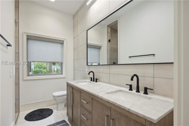 Experience the height of modern luxury with this 2023 on The Golf Club at Indigo Run in South Carolina - for sale on GolfHomes.com, golf home, golf lot