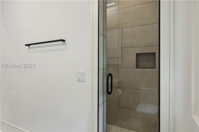 Experience the height of modern luxury with this 2023 on The Golf Club at Indigo Run in South Carolina - for sale on GolfHomes.com, golf home, golf lot