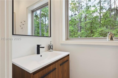 Experience the height of modern luxury with this 2023 on The Golf Club at Indigo Run in South Carolina - for sale on GolfHomes.com, golf home, golf lot