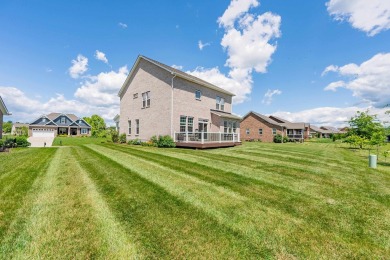 This beautiful two story all brick home with basement in Heron's on Pete Dye River Course of Virginia Tech in Virginia - for sale on GolfHomes.com, golf home, golf lot