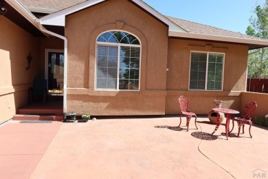 FABULOUS RANCHER WITH PARTIALLY FINISHED BASEMENT SHOWCASING AN on Desert Hawk At Pueblo West in Colorado - for sale on GolfHomes.com, golf home, golf lot