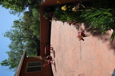 FABULOUS RANCHER WITH PARTIALLY FINISHED BASEMENT SHOWCASING AN on Desert Hawk At Pueblo West in Colorado - for sale on GolfHomes.com, golf home, golf lot