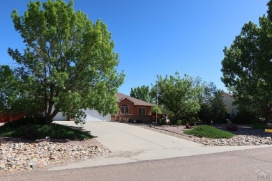 FABULOUS RANCHER WITH PARTIALLY FINISHED BASEMENT SHOWCASING AN on Desert Hawk At Pueblo West in Colorado - for sale on GolfHomes.com, golf home, golf lot