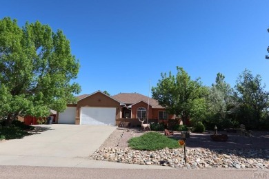 FABULOUS RANCHER WITH PARTIALLY FINISHED BASEMENT SHOWCASING AN on Desert Hawk At Pueblo West in Colorado - for sale on GolfHomes.com, golf home, golf lot