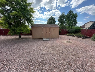 FABULOUS RANCHER WITH PARTIALLY FINISHED BASEMENT SHOWCASING AN on Desert Hawk At Pueblo West in Colorado - for sale on GolfHomes.com, golf home, golf lot
