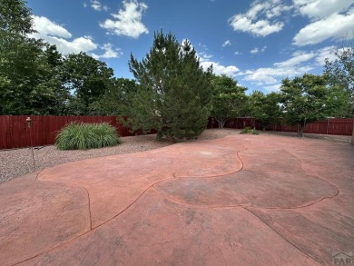FABULOUS RANCHER WITH PARTIALLY FINISHED BASEMENT SHOWCASING AN on Desert Hawk At Pueblo West in Colorado - for sale on GolfHomes.com, golf home, golf lot