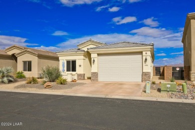 Discover island living at its finest from this serene cul-de-sac on Havasu Island Golf Course in Arizona - for sale on GolfHomes.com, golf home, golf lot