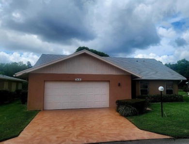 This home in a gated Golf Course community with no mandatory on Cypress Lakes Golf Course - West Palm Beach in Florida - for sale on GolfHomes.com, golf home, golf lot