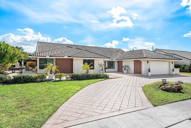 Completely high end renovated, this 3,151 sft home is located in on Boca Woods Country Club in Florida - for sale on GolfHomes.com, golf home, golf lot