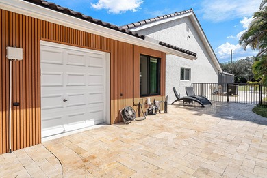 Completely high end renovated, this 3,151 sft home is located in on Boca Woods Country Club in Florida - for sale on GolfHomes.com, golf home, golf lot