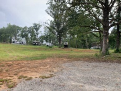 LOOK NO FURTHER THAN EVA RV VILLAGE!! A GREAT FINANCIAL on Magic Valley Golf Course in Tennessee - for sale on GolfHomes.com, golf home, golf lot