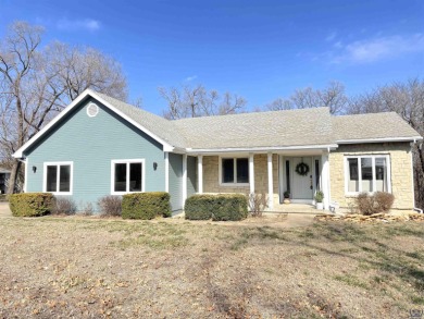 Stunning setting for this 4 BR, 3 BA home on nearly 5 acres on Lake Perry Country Club in Kansas - for sale on GolfHomes.com, golf home, golf lot