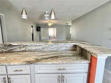 **BEAUTIFUL WIDE OPEN REMODELED KITCHEN WITH EXPANSIVE BREAKFAST on Myerlee Country Club in Florida - for sale on GolfHomes.com, golf home, golf lot