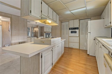 A TRULY INCREDIBLE OPPORTUNITY! This sunny Tarpon Springs gem of on Tarpon Springs Golf Course in Florida - for sale on GolfHomes.com, golf home, golf lot
