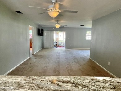 **BEAUTIFUL WIDE OPEN REMODELED KITCHEN WITH EXPANSIVE BREAKFAST on Myerlee Country Club in Florida - for sale on GolfHomes.com, golf home, golf lot