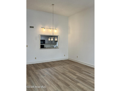 The upgrades look fantastic! NEW FLOORING on the main level; on River Bend Golf and Country Club in North Carolina - for sale on GolfHomes.com, golf home, golf lot