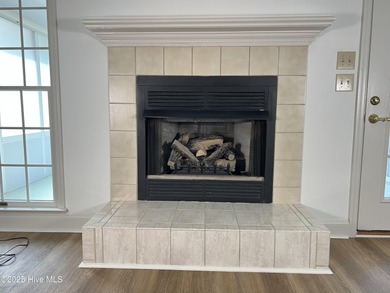 The upgrades look fantastic! NEW FLOORING on the main level; on River Bend Golf and Country Club in North Carolina - for sale on GolfHomes.com, golf home, golf lot