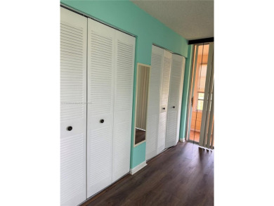 Fabulous 1st floor unit, corner unit, bright and beautiful.  55 on Sunrise Lakes Phase III in Florida - for sale on GolfHomes.com, golf home, golf lot