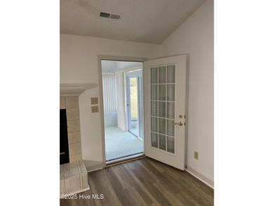 The upgrades look fantastic! NEW FLOORING on the main level; on River Bend Golf and Country Club in North Carolina - for sale on GolfHomes.com, golf home, golf lot