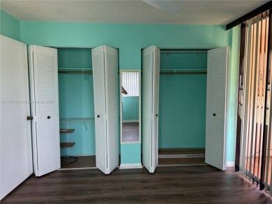 Fabulous 1st floor unit, corner unit, bright and beautiful.  55 on Sunrise Lakes Phase III in Florida - for sale on GolfHomes.com, golf home, golf lot