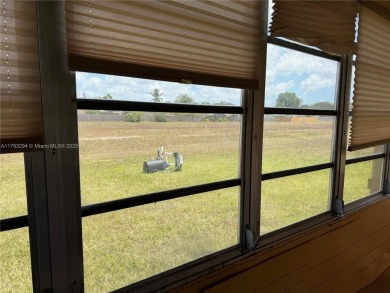 Fabulous 1st floor unit, corner unit, bright and beautiful.  55 on Sunrise Lakes Phase III in Florida - for sale on GolfHomes.com, golf home, golf lot