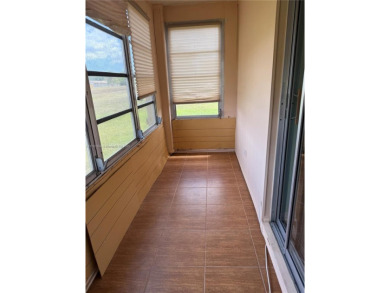 Fabulous 1st floor unit, corner unit, bright and beautiful.  55 on Sunrise Lakes Phase III in Florida - for sale on GolfHomes.com, golf home, golf lot