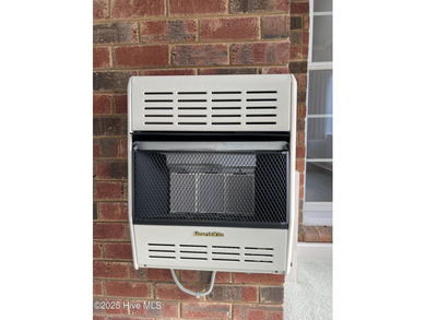 The upgrades look fantastic! NEW FLOORING on the main level; on River Bend Golf and Country Club in North Carolina - for sale on GolfHomes.com, golf home, golf lot