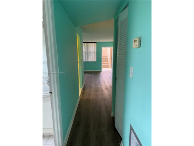 Fabulous 1st floor unit, corner unit, bright and beautiful.  55 on Sunrise Lakes Phase III in Florida - for sale on GolfHomes.com, golf home, golf lot