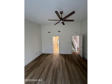 The upgrades look fantastic! NEW FLOORING on the main level; on River Bend Golf and Country Club in North Carolina - for sale on GolfHomes.com, golf home, golf lot