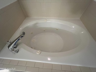 The upgrades look fantastic! NEW FLOORING on the main level; on River Bend Golf and Country Club in North Carolina - for sale on GolfHomes.com, golf home, golf lot