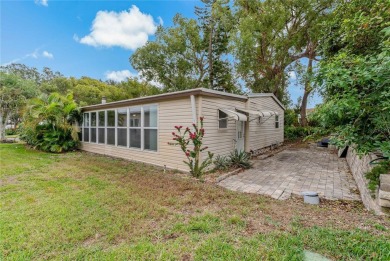 A TRULY INCREDIBLE OPPORTUNITY! This sunny Tarpon Springs gem of on Tarpon Springs Golf Course in Florida - for sale on GolfHomes.com, golf home, golf lot