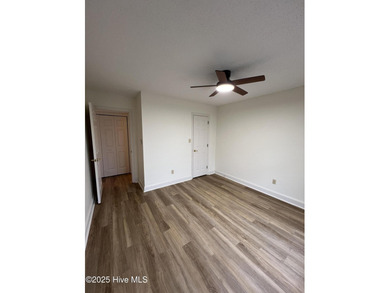 The upgrades look fantastic! NEW FLOORING on the main level; on River Bend Golf and Country Club in North Carolina - for sale on GolfHomes.com, golf home, golf lot