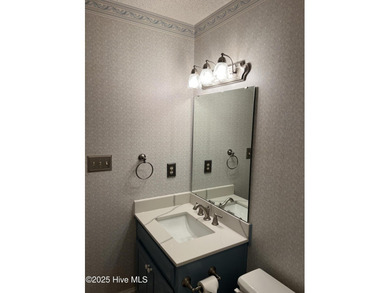 The upgrades look fantastic! NEW FLOORING on the main level; on River Bend Golf and Country Club in North Carolina - for sale on GolfHomes.com, golf home, golf lot