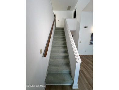 The upgrades look fantastic! NEW FLOORING on the main level; on River Bend Golf and Country Club in North Carolina - for sale on GolfHomes.com, golf home, golf lot