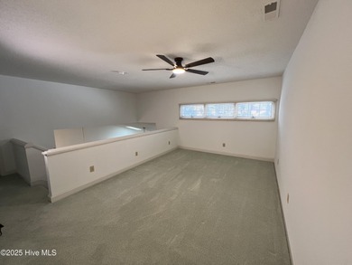 The upgrades look fantastic! NEW FLOORING on the main level; on River Bend Golf and Country Club in North Carolina - for sale on GolfHomes.com, golf home, golf lot