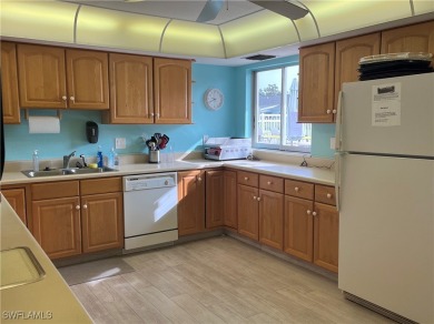 **BEAUTIFUL WIDE OPEN REMODELED KITCHEN WITH EXPANSIVE BREAKFAST on Myerlee Country Club in Florida - for sale on GolfHomes.com, golf home, golf lot