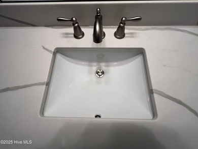 The upgrades look fantastic! NEW FLOORING on the main level; on River Bend Golf and Country Club in North Carolina - for sale on GolfHomes.com, golf home, golf lot