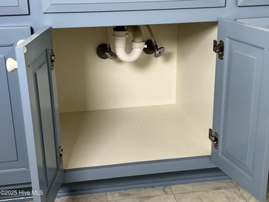 The upgrades look fantastic! NEW FLOORING on the main level; on River Bend Golf and Country Club in North Carolina - for sale on GolfHomes.com, golf home, golf lot