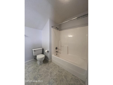 The upgrades look fantastic! NEW FLOORING on the main level; on River Bend Golf and Country Club in North Carolina - for sale on GolfHomes.com, golf home, golf lot