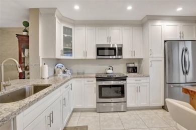 Impeccably upgraded fourth-floor unit featuring two bedrooms and on Flamingo Lakes Country Club in Florida - for sale on GolfHomes.com, golf home, golf lot