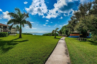 Outstanding Value for a waterfront villa! Best price on the on Isla Del Sol Yacht and Country Club in Florida - for sale on GolfHomes.com, golf home, golf lot