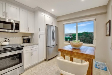 Impeccably upgraded fourth-floor unit featuring two bedrooms and on Flamingo Lakes Country Club in Florida - for sale on GolfHomes.com, golf home, golf lot