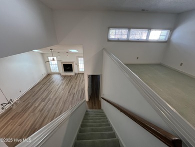 The upgrades look fantastic! NEW FLOORING on the main level; on River Bend Golf and Country Club in North Carolina - for sale on GolfHomes.com, golf home, golf lot