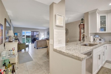 Impeccably upgraded fourth-floor unit featuring two bedrooms and on Flamingo Lakes Country Club in Florida - for sale on GolfHomes.com, golf home, golf lot