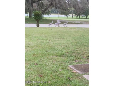 Stunning 4-bedroom 4 bath brick home with metal roof across from on Palatka Golf Club in Florida - for sale on GolfHomes.com, golf home, golf lot