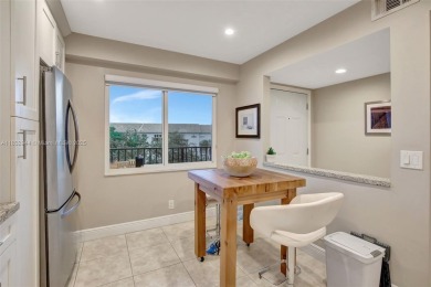 Impeccably upgraded fourth-floor unit featuring two bedrooms and on Flamingo Lakes Country Club in Florida - for sale on GolfHomes.com, golf home, golf lot