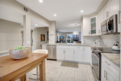 Impeccably upgraded fourth-floor unit featuring two bedrooms and on Flamingo Lakes Country Club in Florida - for sale on GolfHomes.com, golf home, golf lot