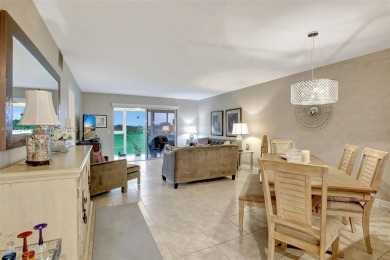 Impeccably upgraded fourth-floor unit featuring two bedrooms and on Flamingo Lakes Country Club in Florida - for sale on GolfHomes.com, golf home, golf lot
