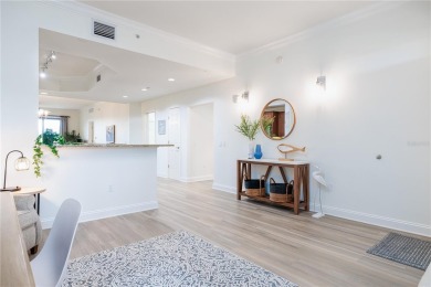 ***NOTE: the sliding door to the balcony is off the living room on Legacy Golf Club in Florida - for sale on GolfHomes.com, golf home, golf lot