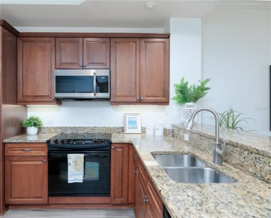 ***NOTE: the sliding door to the balcony is off the living room on Legacy Golf Club in Florida - for sale on GolfHomes.com, golf home, golf lot